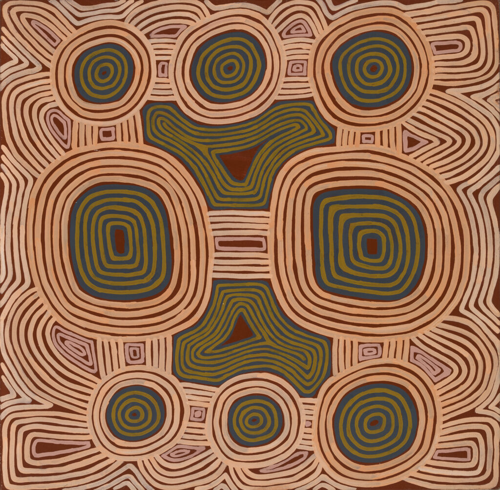 Artwork with red and brown circles representing an overhead view of the NT desert